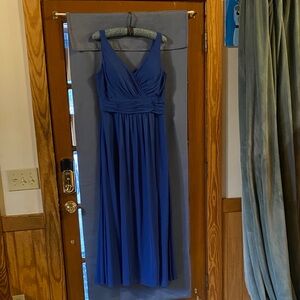 Elegant Blue Sleeveless Dress with pockets